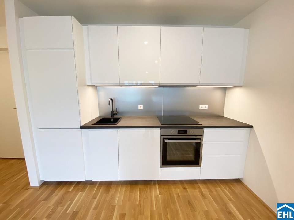 2-Zimmer Erstbezug mit ostseitiger Loggia – Gudrunstraße 120