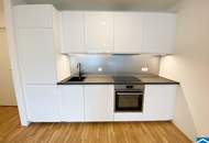 2-Zimmer Erstbezug mit ostseitiger Loggia – Gudrunstraße 120