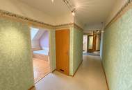 Eigentumswohnung mit ca. 88 m² Wohnfläche, Loggia mit Blick in den Garten und Tiefgaragenstellplatz!