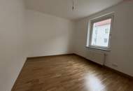 Modernes 4-Zimmer-Familienparadies: einzigartiges Bad mit Dusche & Wanne, flexible Räume und sonnige Küche mit Grünblick – frisch saniert & ab sofort bezugsfrei!