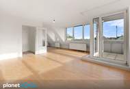 Lichtdurchflutete Dachgeschosswohnung mit traumhaftem Weitblick