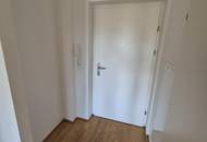 Moderne Neubauwohnung in mondäner Wohngegend mit Balkon