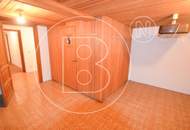 Einfamilienhaus in zentraler Bestlage mit Tennisplatz auf parkähnlichem Grund!