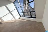 Spektakuläre Dachgeschoßmaisonette mit Terrassentraum und Blick auf die Canisiuskirche