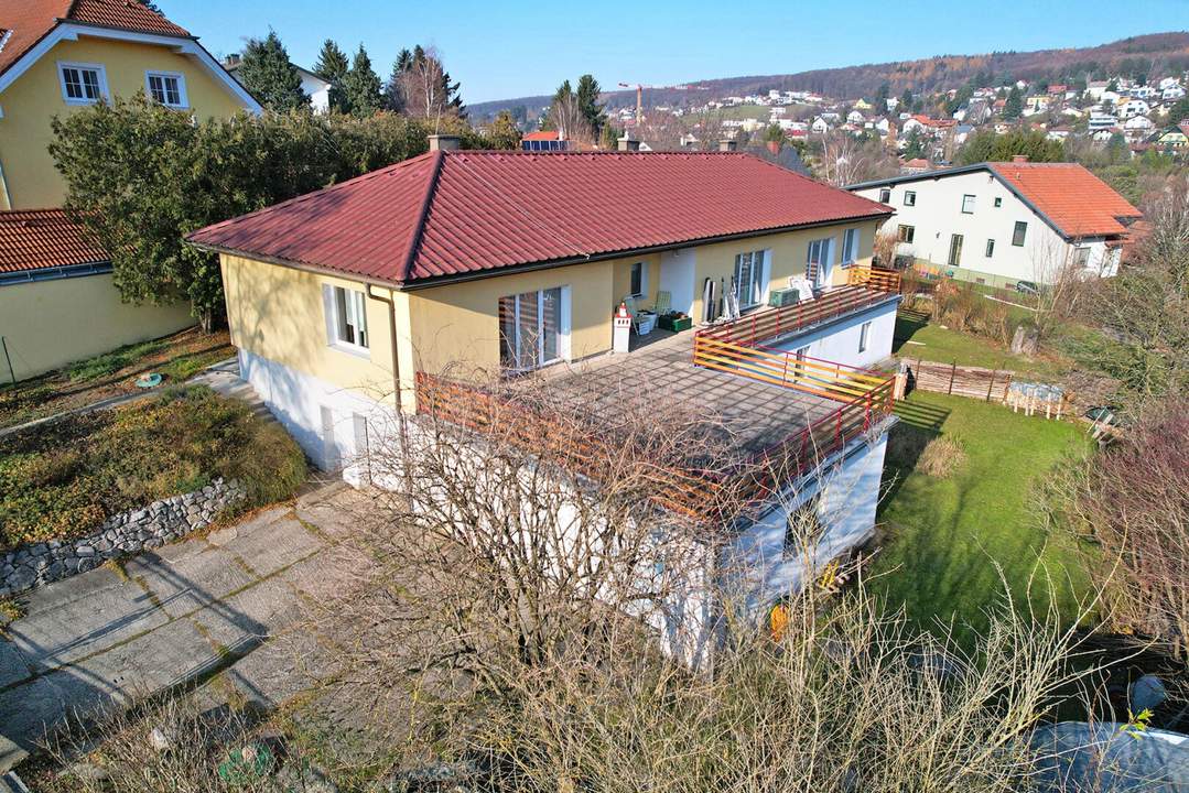 Mehrfamilienhaus mit Traumterrasse und Naturgarten in Zentrumsnähe