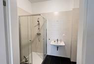 1,5-Zimmer Wohnung mit Gartenterrasse in generalsaniertem Neubau mit 11m2 Terrasse und einer tollen Raumhöhe!