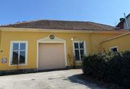 Haus mit 180 m² Garagenhalle und großem Garten