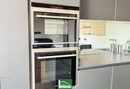 Schöne DG-Wohnung in ruhiger Lage mit hochwertiger Küche & langem Balkon