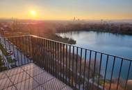 Exklusiver Neubau im 10. Stock mit Seeblick, Kochinsel & großzügigem Balkon – moderne 3-Zimmer-Wohnung