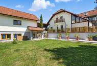 High-end living in a peaceful green location! A feel-good retreat in a class of its own: tradition meets state-of-the-art comfort!