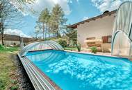 Tirolerhaus mit großem Garten, Pool und Baugrund – attraktive Lage in Scharnitz-Gießenbach