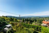 Einfamilienhaus mit Einliegerwohnung, Garage, Carports und Ausblick!