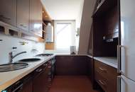 CHARMANTE 3-ZIMMER-DACHGESCHOSSWOHNUNG MIT DACHTERRASSE UND GRÜNBLICK