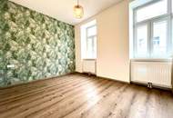 Elegante 3-Zimmerwohnung mit Balkon in saniertem Altbau