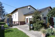 3-Zimmer-Bungalow auf 870 m² Grund mit neuem Dach und Pelletszentralheizung
