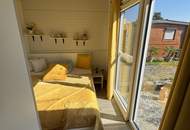 Neuwertiges Ferienhaus auf Pachtgrund in Rust: 28 m², 2 Zimmer und 2 Stellplätze