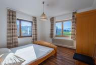 Kärntner Wohncharme in Seenähe – 5-Zimmer-Wohnung mit Kachelofen & Balkon