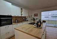 Exklusive 3-Zimmer-Gartenwohnung mit zwei PKW-Abstellplätzen