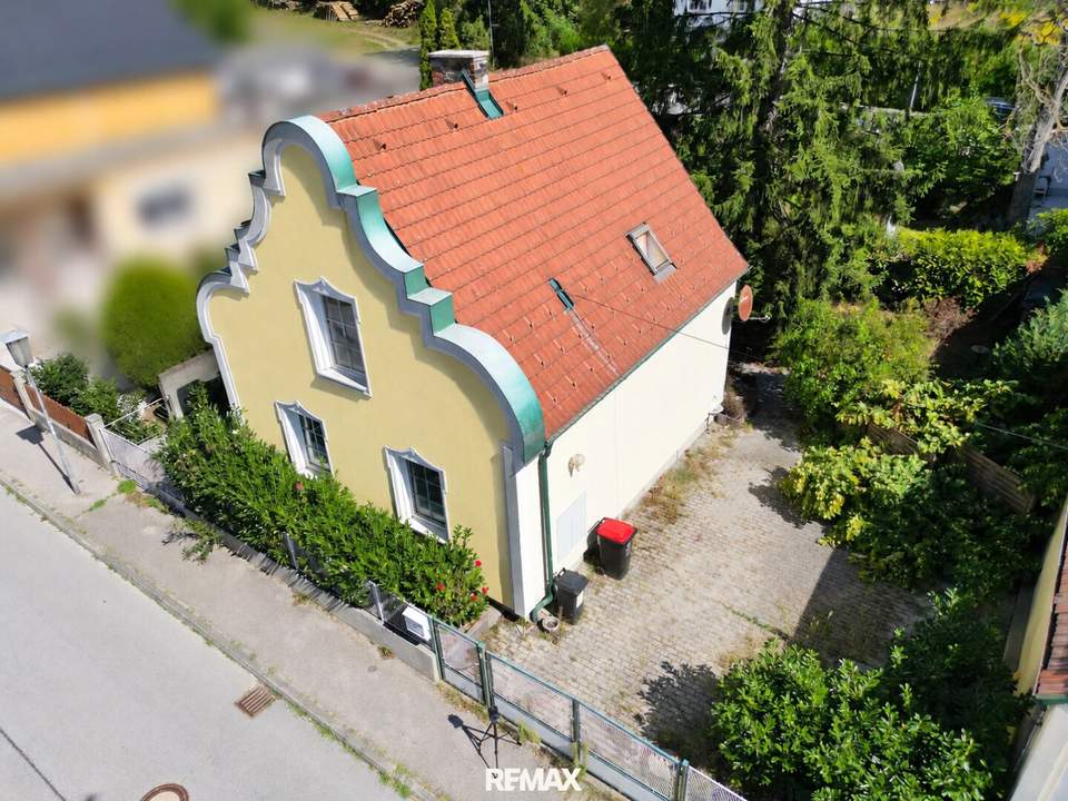 Einfamilienhaus mit Garten und vielseitig nutzbarem Nebengebäude