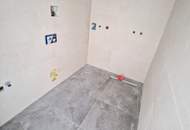 Hochwertig sanierte 2-Zimmer-Wohnung mit Loggia – Stilvoller Wohnkomfort in ruhiger Lage + Top-Anbindung + effizienter Heiztechnik