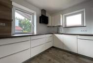 Mehrparteienhaus mit Garage/Lager/Büro - Dorfwidmung