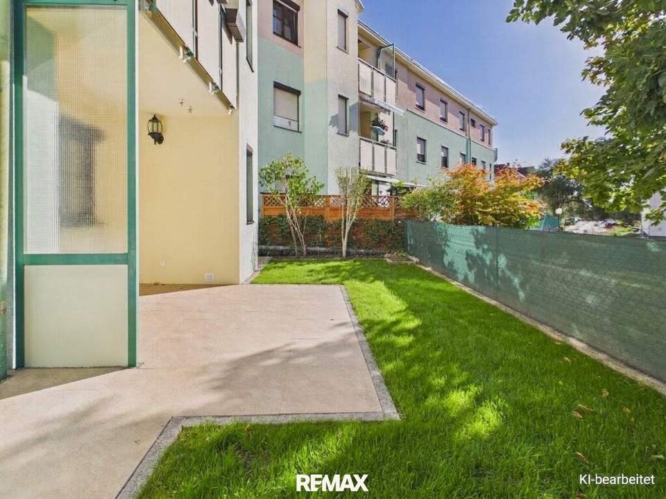 Moderne Erdgeschosswohnung mit Garten, Garage und Blick ins Grüne