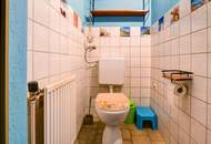NEUER PREIS !!! Attraktive Gelegenheit für Käufer mit Blick für Potenzial – Einfamilienhaus mit Nebengebäude in Karlsdorf