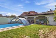 Energieeffizientes, großzügiges Einfamilienhaus mit Pool, sonnigem Garten und beheiztem Wintergarten!