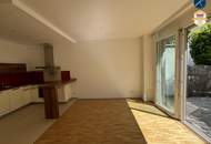 neuwertige 2-Zimmer-Wohnung mit Garten und Pkw-Stellplatz