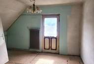 Renovierungsbedürftiges Einfamilienhaus in traumhafter Aussichtslage mit sonnigem Grundstück