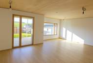 Modernes Plus-Energie-Reihenhaus in Massivholzbauweise