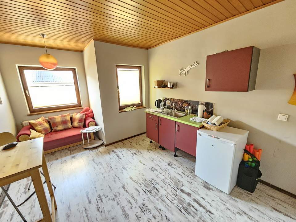 Lichtdurchflutete 3 - Zimmer Wohnung mit separtem Eingang und Eigengarten in ruhiger Siedlungslage