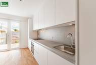 Hochwertige Erstbezugs-Wohnung mit großem Hof-Balkon und Küche nahe Schönbrunn!