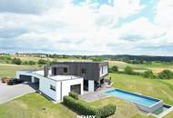 Architektenhaus in sonniger Ruhelage mit Spiral-Weinkeller, Infinity Pool, Burgblick und ca. 1 ha Eigengrund