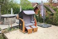 Ein einzigartiges Zweifamilienhaus mit Schwimmteich.