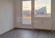 Vollsanierte 4-Zimmer-Wohnung mit 27 qm Südwest-Terrasse nahe Wienerberg City