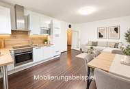 großzügige geschnittene, westseitige 2 Zimmerwohnung