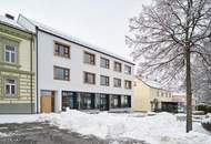 Vollvermietetes Neubau-Zinshaus am Hauptplatz Schrems – nachhaltig & architektonisch herausragend