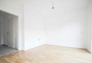 WOHNEN WO ANDERE URLAUB MACHEN! 2-ZIMMER-WOHNUNG MIT GROSSEM GARTEN UND PKW-STELLPLATZ! ERSTBEZUG!