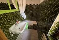 Erhaltenswertes Gebäude im Grünland