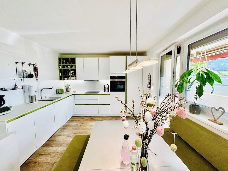 Familienfreundliche 4-Zimmer-Wohnung mit Tiefgaragenabstellplatz, Loggia, Gartenanlage & nachhaltiger Heizung