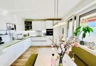 Familienfreundliche 4-Zimmer-Wohnung mit Tiefgaragenabstellplatz, Loggia, Gartenanlage & nachhaltiger Heizung
