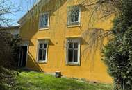 Haus mit 180 m² Garagenhalle und großem Garten