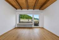 Dachgeschosswohnung an der Skipiste mit Kaiserblick