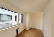 Eleganz trifft Lage – Neubau-Dachgeschosswohnung in Toplage