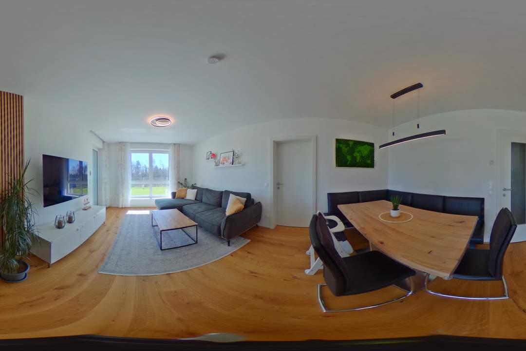 Exklusives Wohnen im Erdgeschoss: 4-Zimmer-Eigentumswohnung mit DAN Küche, Terrasse und Garten