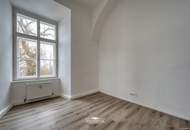 Helle 3-Zimmerwohnung im 1.OG mit besonderer Raumhöhe und viel Charme