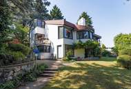 1170 AM HEUBERG: GROßZÜGIGER FAMILIENWOHNSITZ MIT INDOORPOOL, WELLNESS, GARTEN &amp; WIEN-BLICK