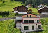 Exklusives 3-Zimmer-Apartment mit Garage & spektakulärem Panoramablick in See (Top 1)
