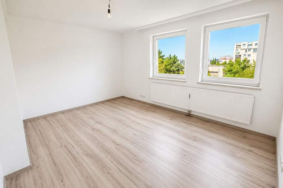 Großzügige 3 bis 4-Zimmer-Wohnung mit Kamin, sonniger Loggia und Stellplatz, Wohnung-kauf, 495.000,€, 1210 Wien 22., Donaustadt